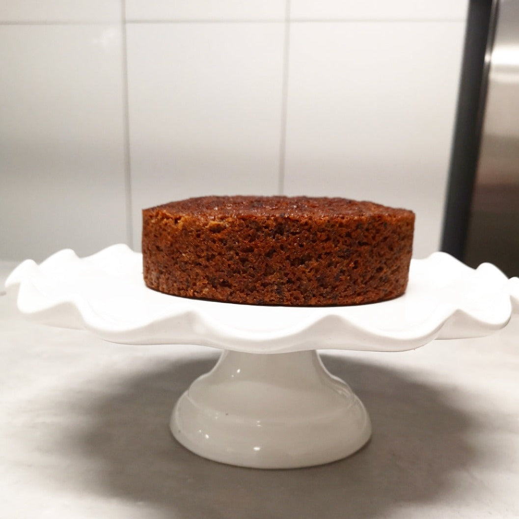 Caribbean Fruit Cake on white cake stand